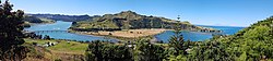 Mōkau panorama: river, SH3 bridge, beach - and Mt. Taranaki far away (82km = 51mi) in the background