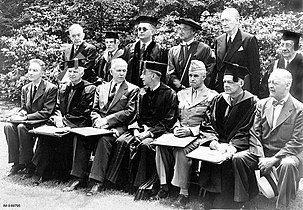 Award of honorary degrees at Harvard to J Robert Oppenheimer (left), George C. Marshall (third from left), Omar N. Bradley (fifth from left), and T. S. Eliot (second from right). The President of Harvard University, James B. Conant, sits between Marshall and Bradley. 5 June 1947.