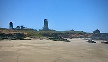 Piedras Blancas Light Station viewed from the beach below, May 2020