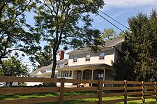 Privately-owned colonial along Woodens Lane