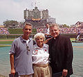 Coughlin with his mother Louise Coughlin and Rahm Emanuel, Wrigley Field, 2003