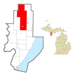 Location within Menominee County (red) and the state of Michigan; administered village of Powers in pink