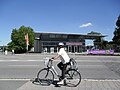 Theater of Ansbach (Bavaria) with a woman on bicycle in the foreground