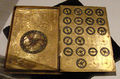 A cypher machine in the shape of a book, with arms of Henri II.