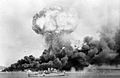 Image 63An oil storage tank explodes during the first Japanese air raid on Darwin on 19 February 1942 (from Military history of Australia during World War II)