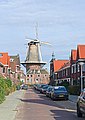 The mill visible at the end of Vanheemstrastraat, Delft, in February 2022.