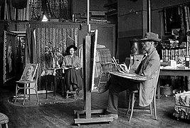 No 115: Étienne Buffet (1866-1948) em seu atelier no 115, Boulevard Saint-Michel, pintando sua esposa Cornélie Blanchemain enquanto estava de licença em outubro de 1916.