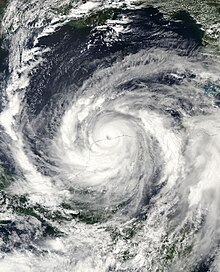 Satellite imagery of a mature hurricane entering the Gulf of Mexico.