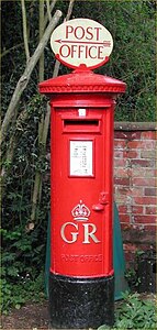 PB27/1 pillar of George V, fitted with a Post Office Direction Sign (POD) at the Colne Valley Postal History Museum, Essex