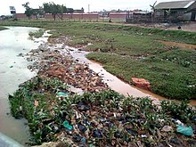 Poorly disposed garbage along Lubigi Wetland, Nansana in Kampala, Uganda