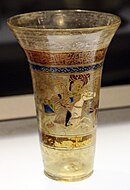 Beaker with polo players, Syria, 1250-1300, with gold and enamel, found in Italy