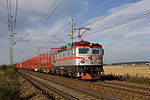 TÅGAB Rc2 (also ex-ÖBB) with an empty wood train near Hallsberg.