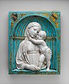 Virgin and Child in a niche by Luca della Robbia (c. 1460)