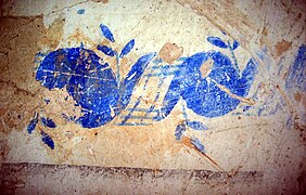 Detalle de cenefas con motivos ornamentales en azulete en el zócalo de la ermita de San Pedro en El Cuervo (Teruel).