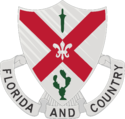The shield is white, the old Infantry color. The saltire is taken from the Florida State flag. The sheathed sword, from the Spanish War service medal, represents service during that war. The cactus symbolizes service on the Mexican Border, and the fleur-de-lis, service during World War I.[1]