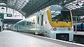 175110 (Arriva Trains Wales), showing off it's "Ghost livery", sits at Piccadilly with a service to Southern Wales.