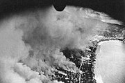 The Tarumiza district of Kagoshima burns after B-29 air raids on the city, 17 Jun 1945