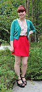 Woman in a red miniskirt and green cardigan crop, 2012
