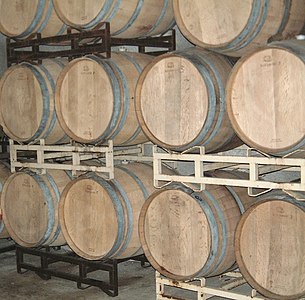 Zinfandel aging in barrels in a wine cave