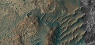 Close, color view of unusual transverse aeolian ridges, TAR's, as seen by HiRISE under HiWish program These features may have had variable local winds to make the wavy tops.