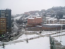A snow-covered urban panorama.