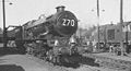 Engine 6000 King George V at Swindon having just hauled the last King-hauled train from Wolverhampton and Birmingham Snow Hill (1962). Note the bell which was given to the engine when it toured the U.S. This engine is now preserved. Steam trains would be scraped under British Railways' Modernisation Plan. CO2 and ash clouds at the ready!