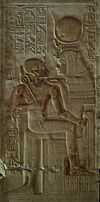 Isis holds Pharaoh Seti I in her lap.