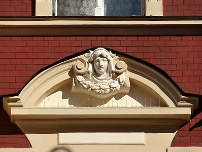 Pediment with woman figure