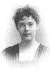 Photo of Elizabeth Bisland taken around 1891, a head and shoulders portrait of a young women with curly hair
