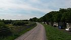 Blick vom Ruhrdeich auf die Alte Ruhr bei Alstaden und die Straße Am Ruhrufer