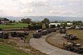 Ravitaillement d'une escouade de TRM 10000 lors d'un exercice en terrain libre.