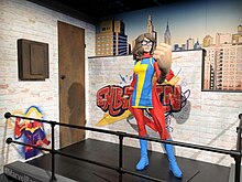 Photo of Ms. Marvel statue with the left hand in an embiggened fist