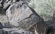 A Petroglyph is a marking carved into a rock usually using a stone tool.