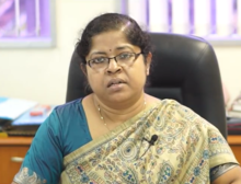 Indian woman, sitting, spectacles