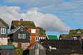 Image 7Traditional Faroese houses with turf roof in Reyni, Tórshavn. Most people build larger houses now and with other types of roofs, but the turf roof is still popular in some places. (from Culture of the Faroe Islands)
