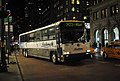 A 2003-model MCI D4500 Commuter Coach on the SIM23 Staten Island-Manhattan express route, a formerly Academy-operated route. This bus has since been replaced with Van Hool CX45 and C2045 models. The route was given to MTA NYCT in 2022.