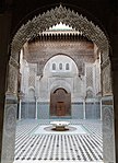 A lambrequin or "muqarnas" arch with muqarnas decoration in the Madrasa al-Attarine, Fes (1323-1325)