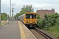 A Merseyrail Class 508 arrives with a service from Liverpool.
