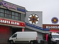 An auseklis ornament on the facade of the Minska Shopping Center in Riga, Latvia