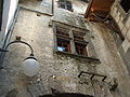 The distinctive stone-cross windows in the town