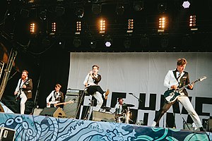 The Hives performing in July 2018; from left to right: Vigilante Carlstroem, The Johan and Only, Howlin' Pelle Almqvist, Chris Dangerous, Nicholaus Arson