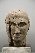 Etruscan pear wood head. 7th century B.C.