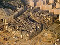 Image 28By 1990, the Kowloon Walled City contained 50,000 residents within its 2.6-hectare (6.4-acre) borders. (from History of Hong Kong)