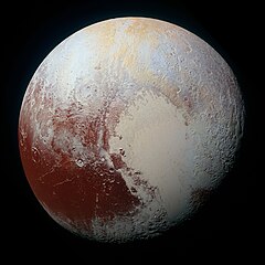 Multispectral Visual Imaging Camera image of Pluto in enhanced color to bring out differences in surface composition.