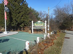 Welcome to Ridge sign on NY 25 and Ridge Road.