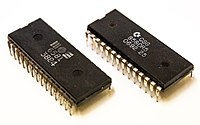 Two 1980s microchips on a white background