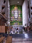 Graham Sutherland's Christ tapestry in the rebuilt Coventry Cathedral; 1962.[158]