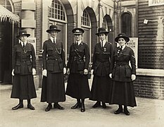 Mary Sophia Allen surrounded by 4 of her policewomen