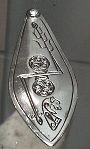 Plaque from Norrie's Law hoard showing Double disc and Z-rod