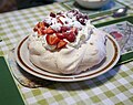 Image 16Pavlova, a popular New Zealand dessert, garnished with cream and strawberries. (from Culture of New Zealand)